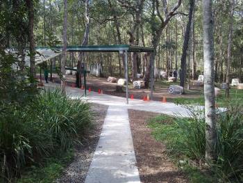 A photo of the concrete path to the practice range